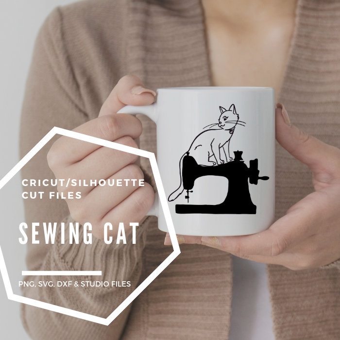 cat on sewing machine cut image