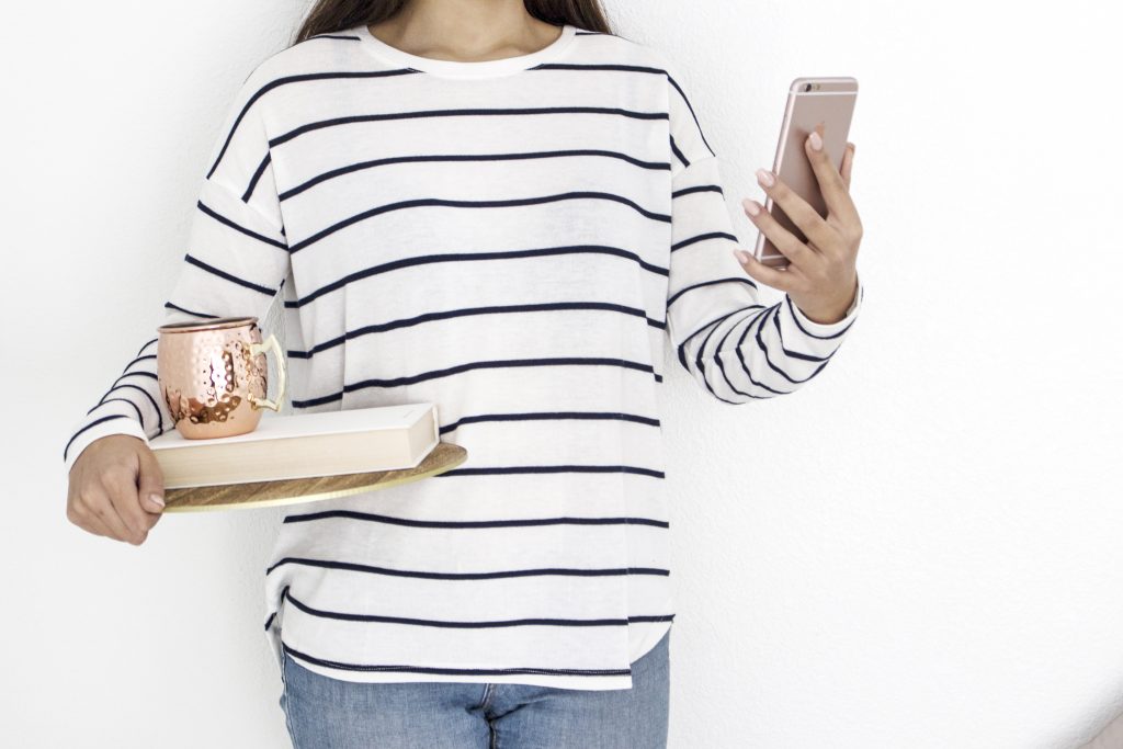 woman looking at her phone